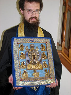 Priest Paul Akmolin